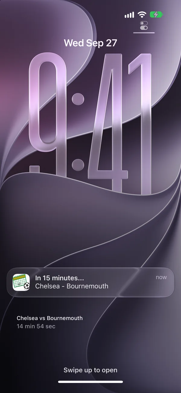 The Lock Screen with a kick-off reminder notification and the countdown widget